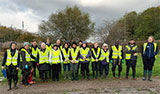 Photo of volunteers joining Bristol Avon Rivers Trust for a day of river litter picking in Stoke Brook